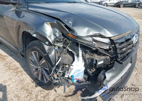 2022 Hyundai Tucson Blue from USA, damaged, VIN KM8JBCA18NU075192